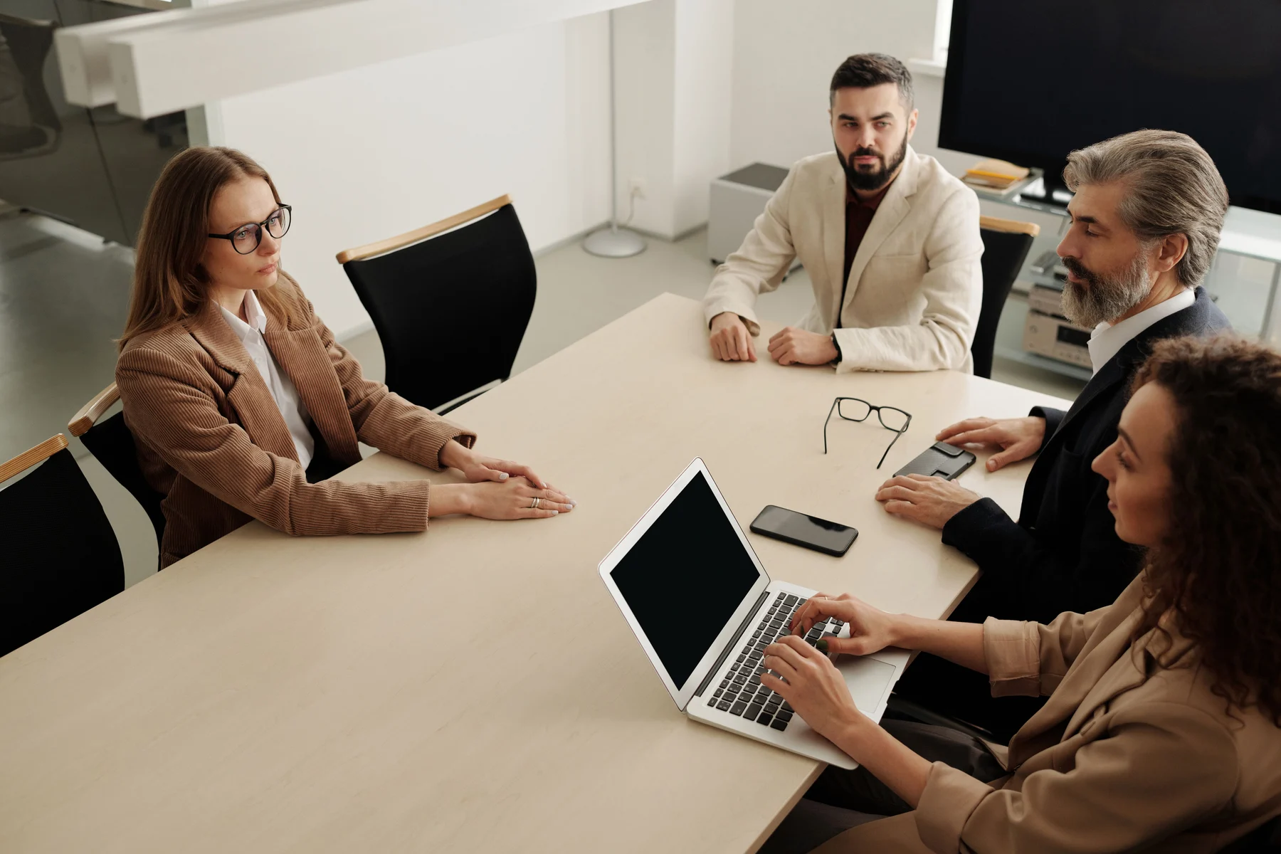 Editorial photograph of a project planning conversation in an office